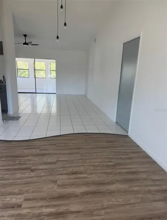 a view of an empty room and window