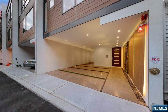 8824 Churchill Road North Bergen, NJ 07047 - Photo 18 of 50 a lobby with a couch and a stove