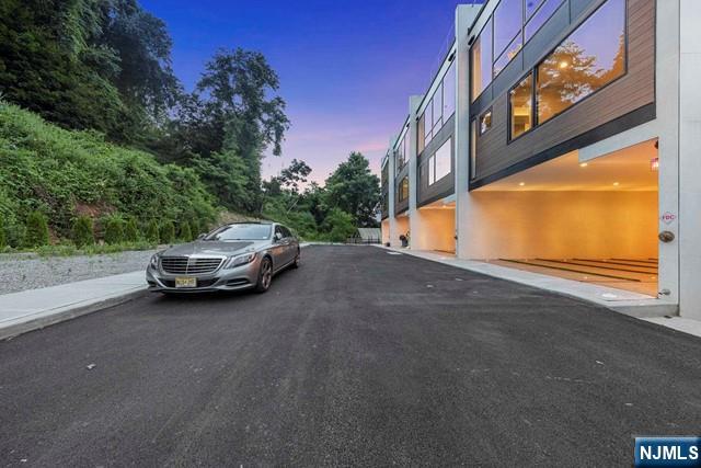 8824 Churchill Road North Bergen, NJ 07047 - Photo 2 of 50 a view of street with parked cars
