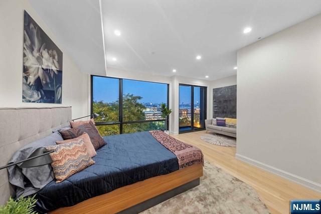 8824 Churchill Road North Bergen, NJ 07047 - Photo 27 of 50 a living room with furniture and a floor to ceiling window
