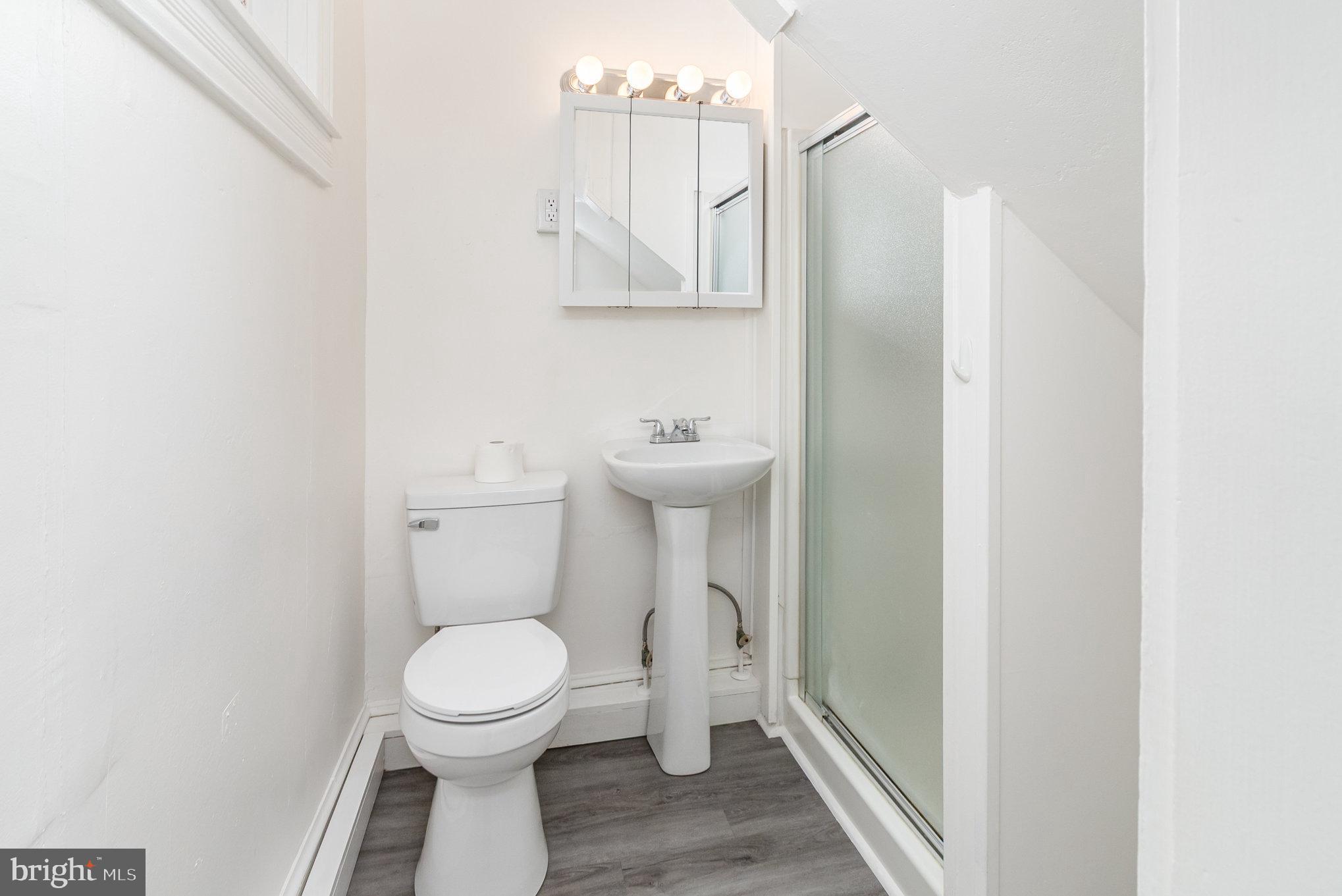 517 High Street Chestertown, MD 21620 - Photo 16 of 51 a bathroom with a toilet and a sink