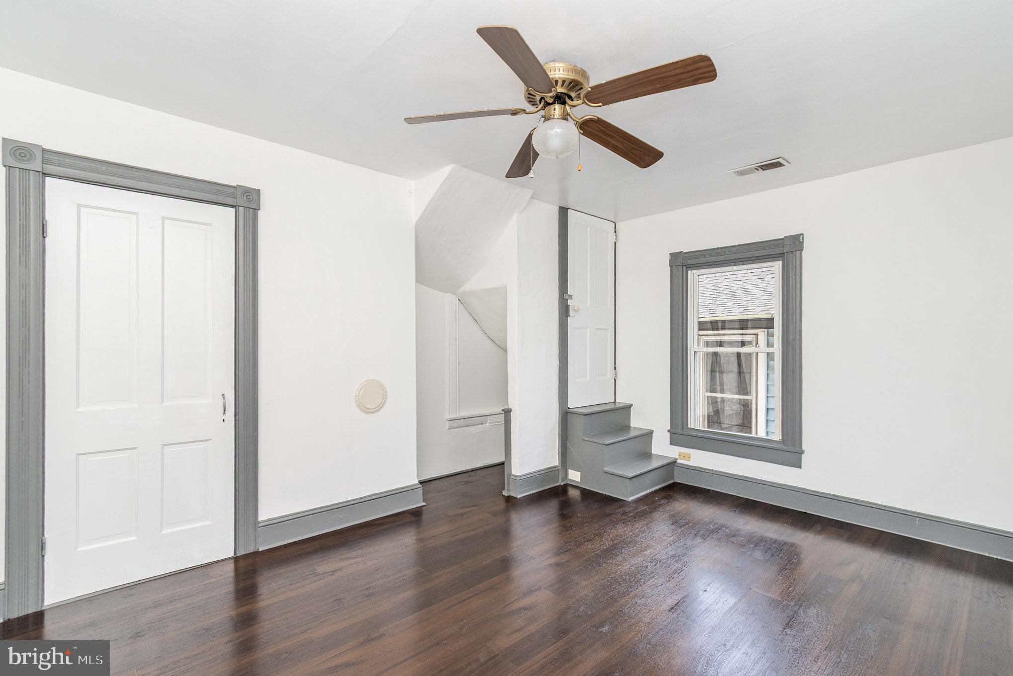 517 High Street Chestertown, MD 21620 - Photo 26 of 51 a view of empty room with wooden floor and fan