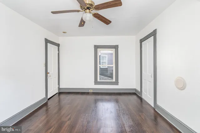 a bathroom with a sink a tub and a mirror
