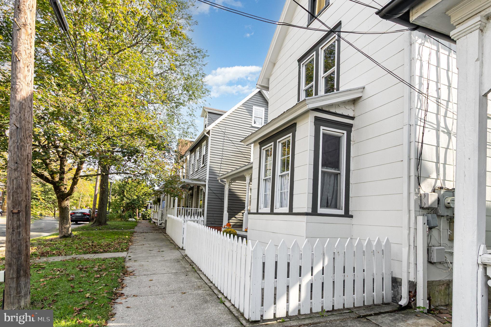 517 High Street Chestertown, MD 21620 - Photo 3 of 51 a view of a white house with iron fence
