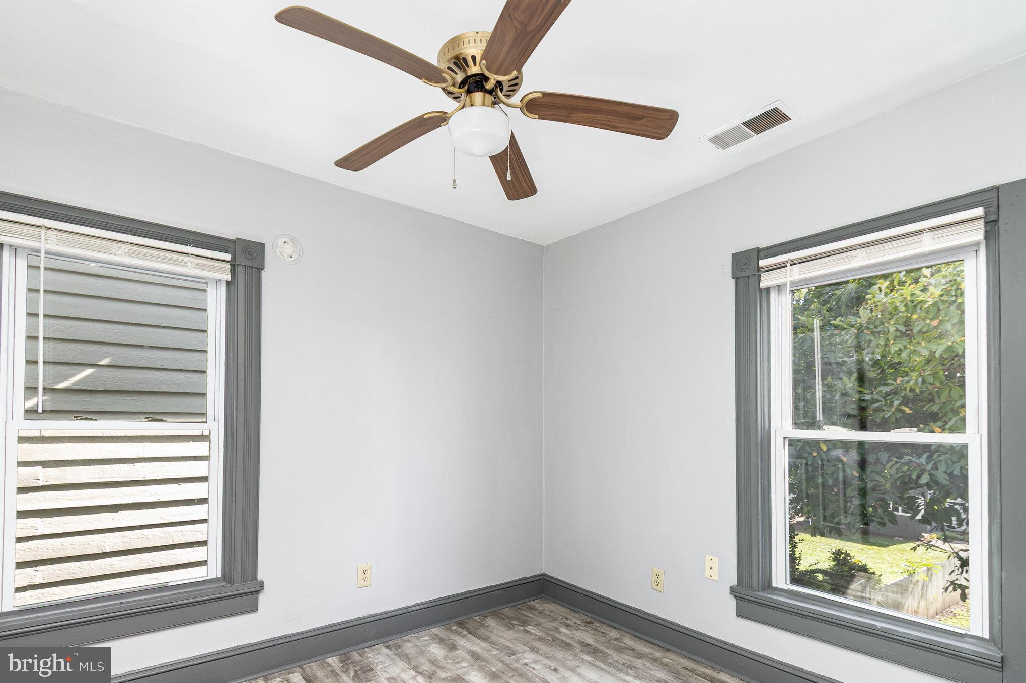 517 High Street Chestertown, MD 21620 - Photo 34 of 51 a view of a livingroom with a ceiling fan and window