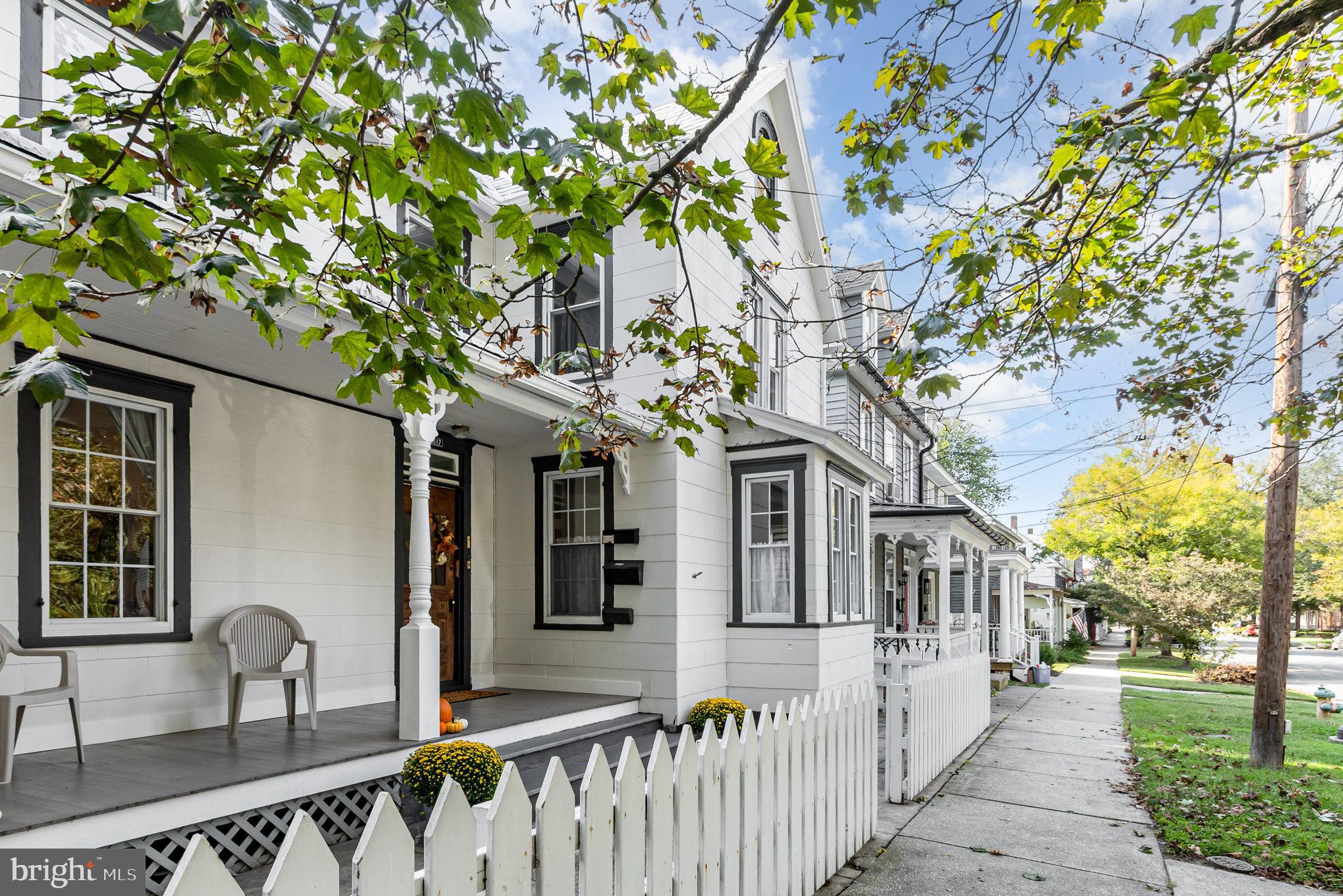 517 High Street Chestertown, MD 21620 - Photo 49 of 51 a front view of a house with large trees