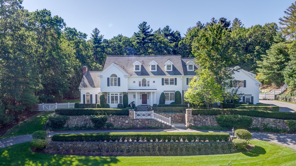 18 Meadowbrook Road Weston, MA 02493 - Photo 1 of 29 front view of a house with a yard
