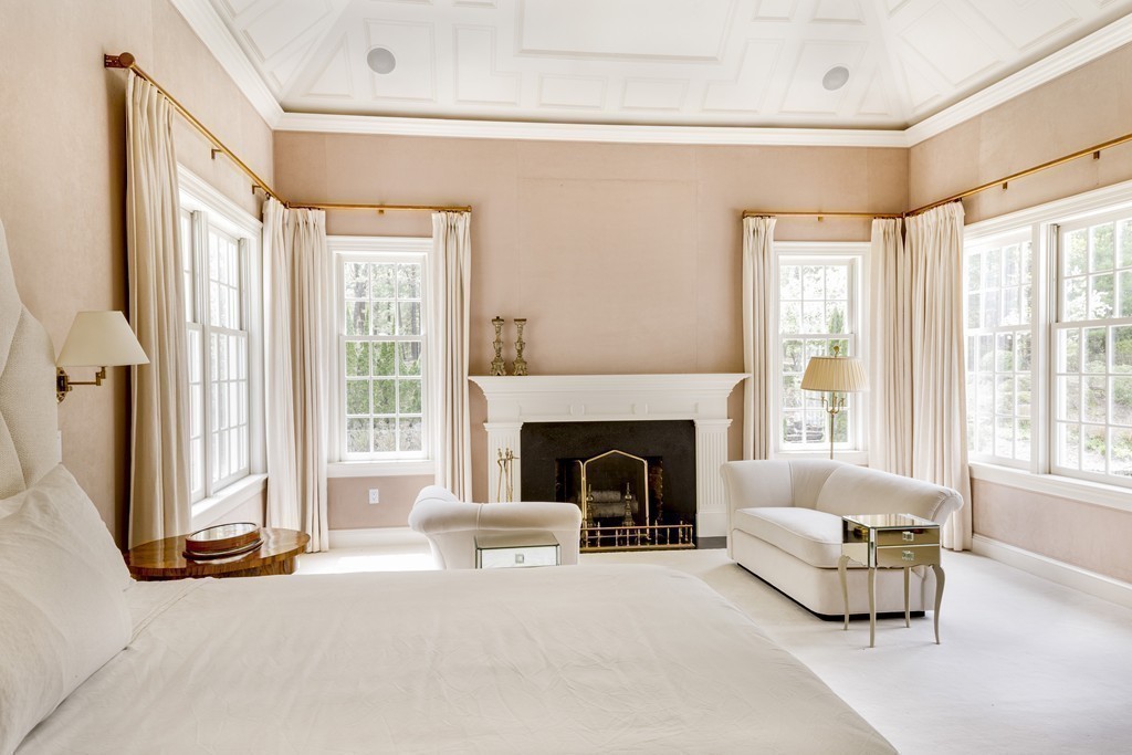 18 Meadowbrook Road Weston, MA 02493 - Photo 11 of 29 a living room with furniture and a fireplace