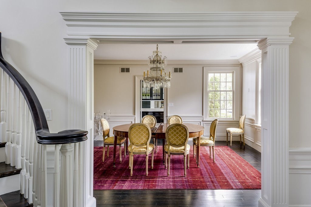 18 Meadowbrook Road Weston, MA 02493 - Photo 17 of 29 a view of a dining room with furniture and wooden floor