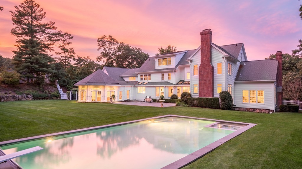 18 Meadowbrook Road Weston, MA 02493 - Photo 2 of 29 a view of a house with a yard and a large tree