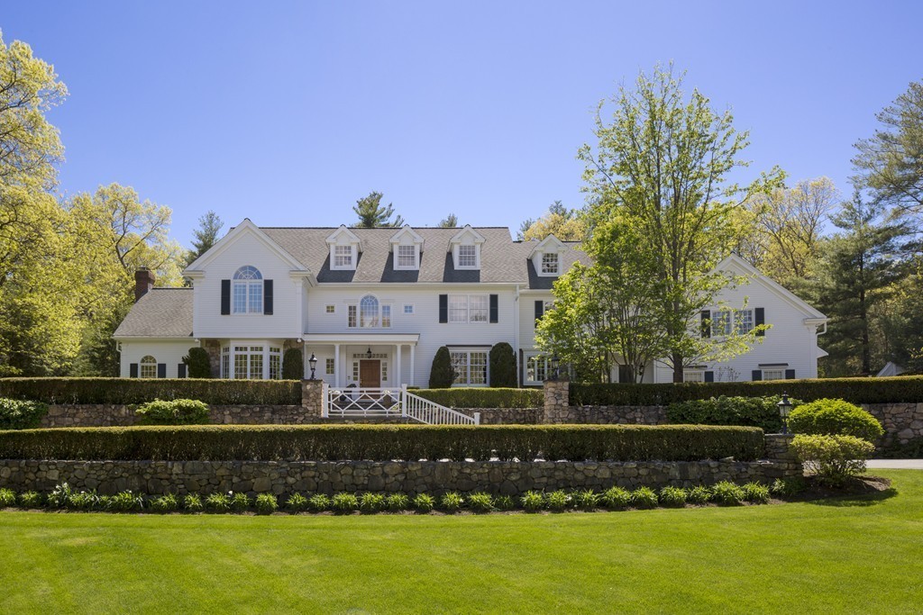 18 Meadowbrook Road Weston, MA 02493 - Photo 27 of 29 a front view of a house with a garden