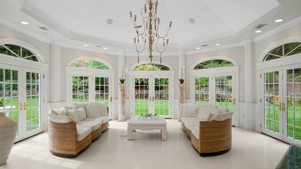 18 Meadowbrook Road Weston, MA 02493 - Photo 8 of 29 a living room with furniture and a large window