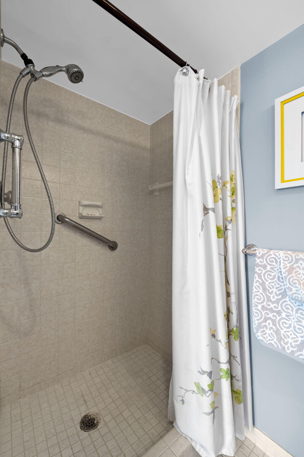 15 Royal Palm Way, Unit 505 Boca Raton, FL 33432 - Photo 15 of 32 a bathroom with a shower curtain and a window