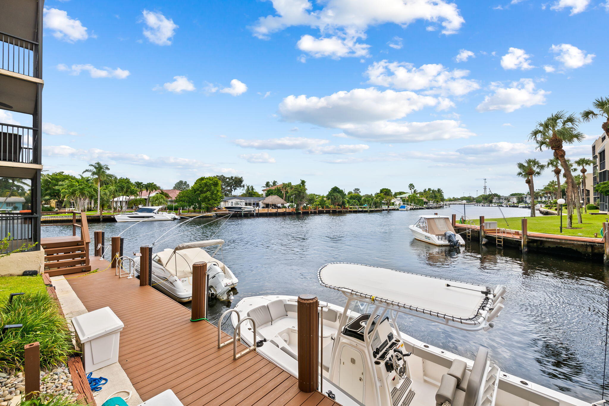 15 Royal Palm Way, Unit 505 Boca Raton, FL 33432 - Photo 21 of 32 a view of a lake with a table and chairs