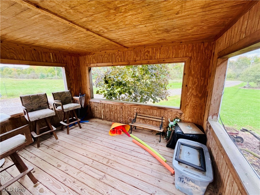 2687 Griggs Road Jefferson, OH 44047 - Photo 13 of 41 Sunroom / solarium featuring wooden ceiling and a healthy amount of sunlight