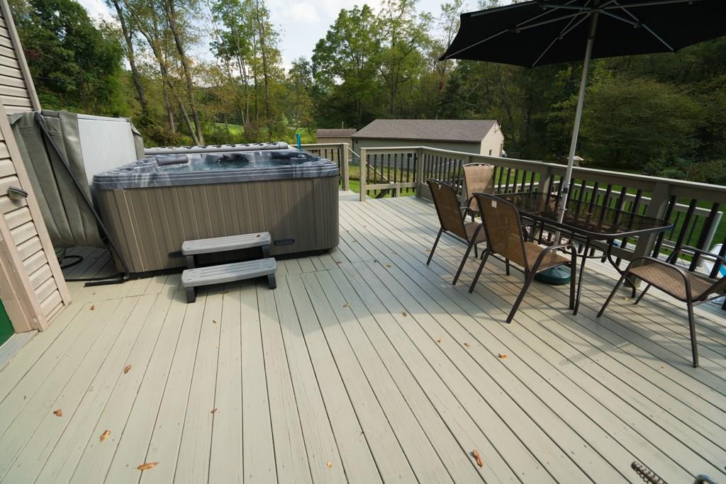 244 Walker Road Apollo, PA 15613 - Photo 20 of 25 Imagine stepping out onto this deck and slipping into the warm, jetted hot tub on a cool Fall or cold Winter night.