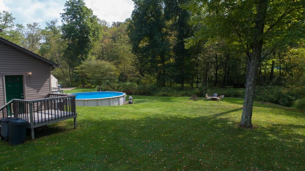 244 Walker Road Apollo, PA 15613 - Photo 21 of 25 Small side porch off of the 1st Floor Laundry leads to a large side yard.