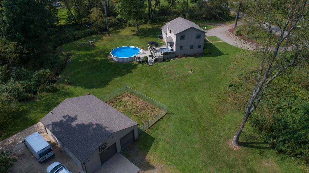 244 Walker Road Apollo, PA 15613 - Photo 23 of 25 The LARGE Out Building has 2 car bays, a half bath, running water, electricity, heat and A/C, an RV parking pad that includes hook-ups!