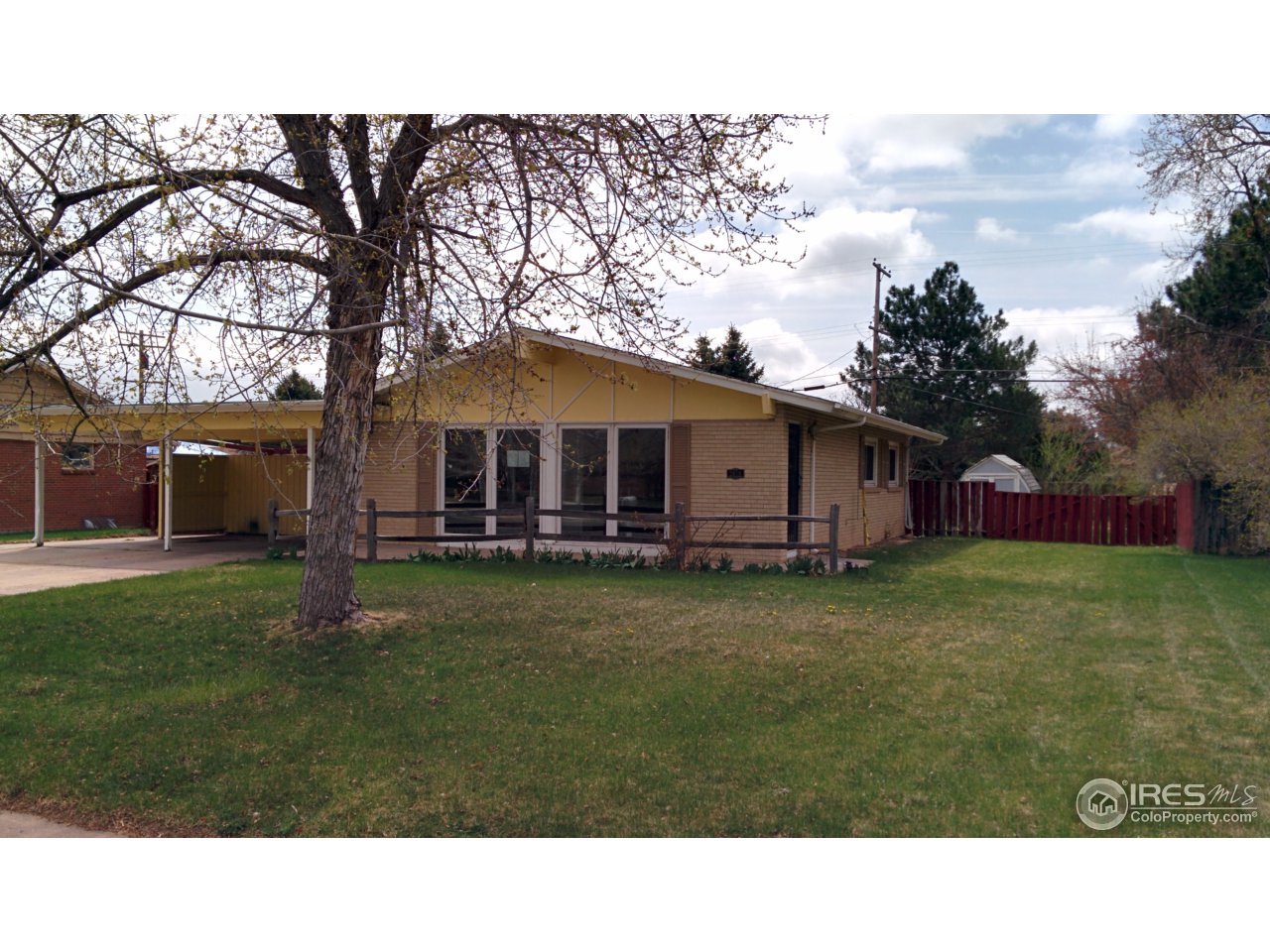 2478 25th Street Road Greeley, CO 80634 - Photo 2 of 19 a black and white photo of a house