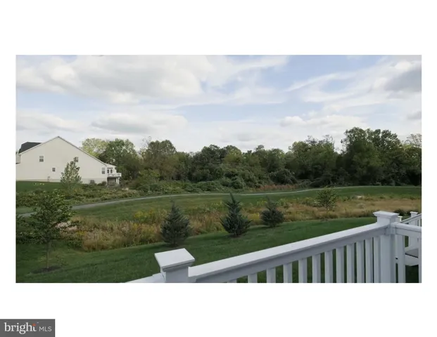 a terrace view with a lake view