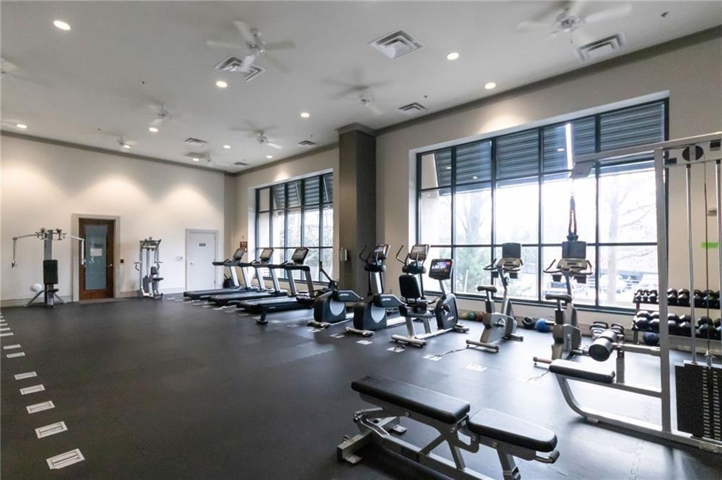 3040 Peachtree Road, Unit 813 Atlanta, GA 30305 - Photo 24 of 28 a view of a room with gym equipment