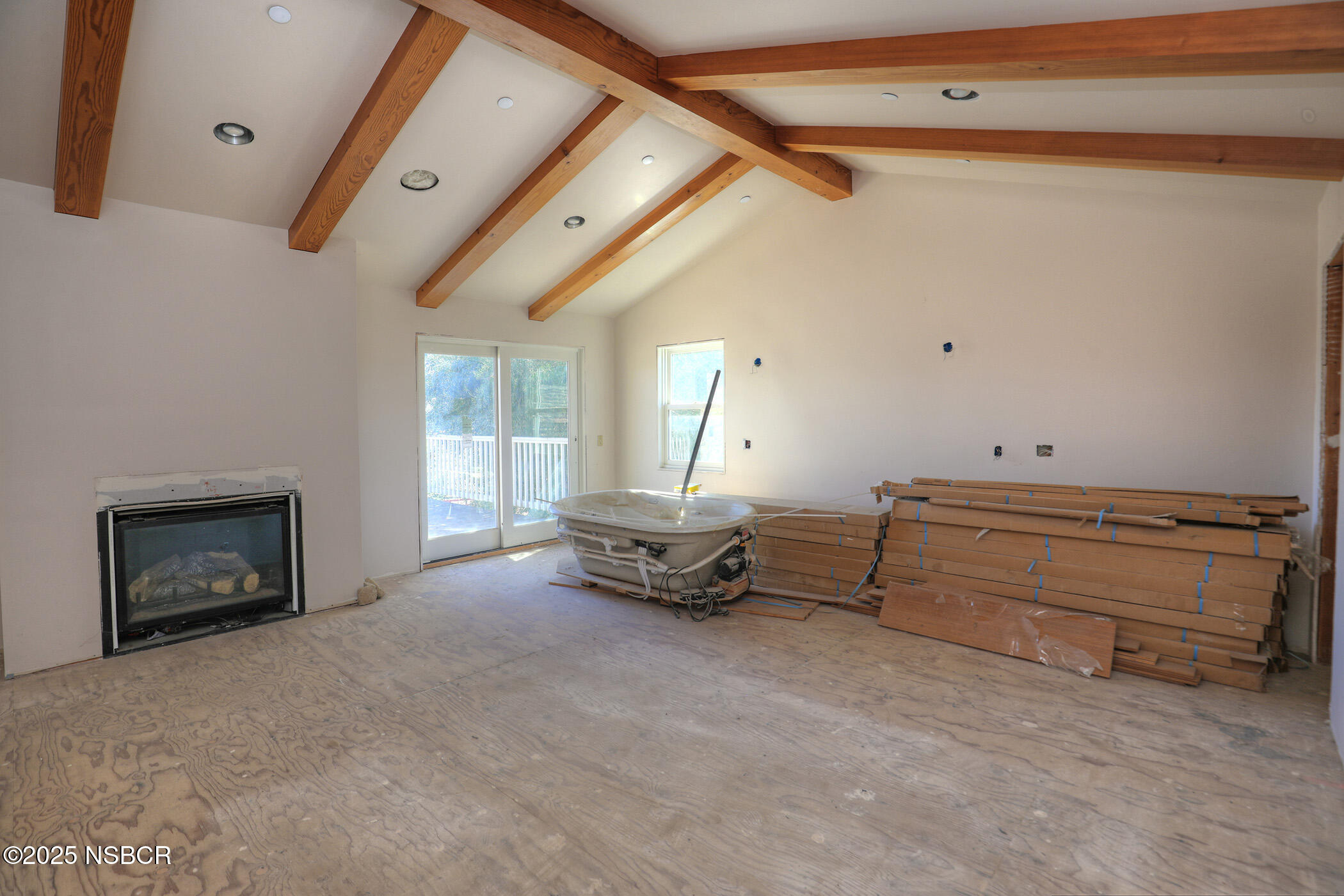 2000 North Refugio Road Santa Ynez, CA 93460 - Photo 7 of 36 a living room with furniture and a fireplace