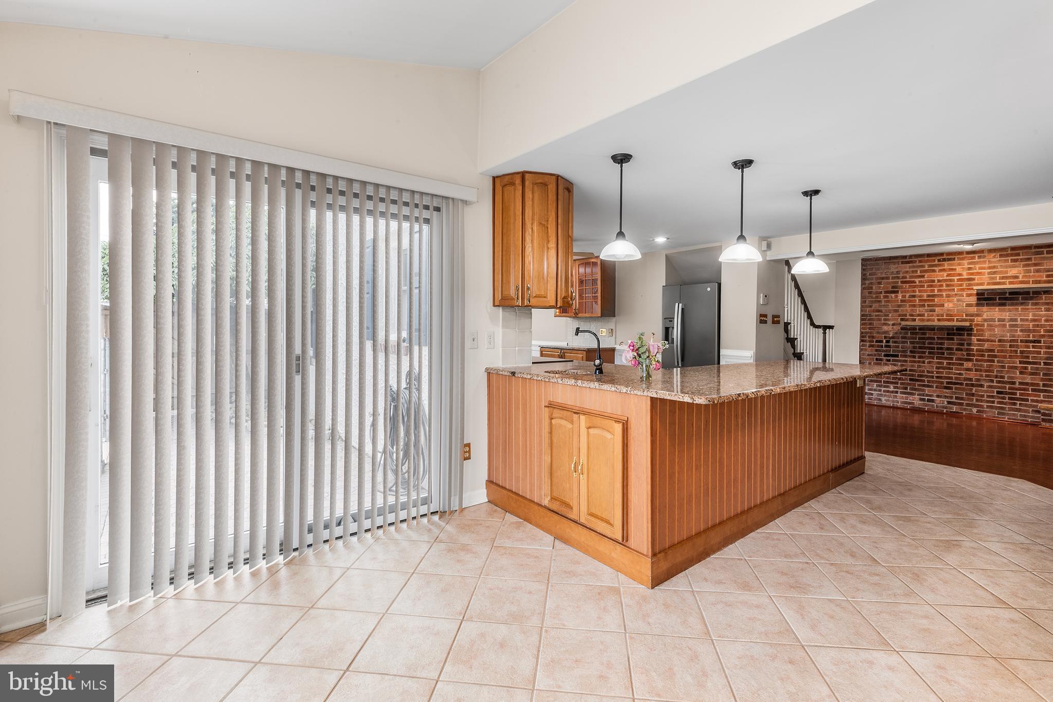 2747 Springhill Road Secane, PA 19018 - Photo 12 of 40 Den with French doors out to pool
