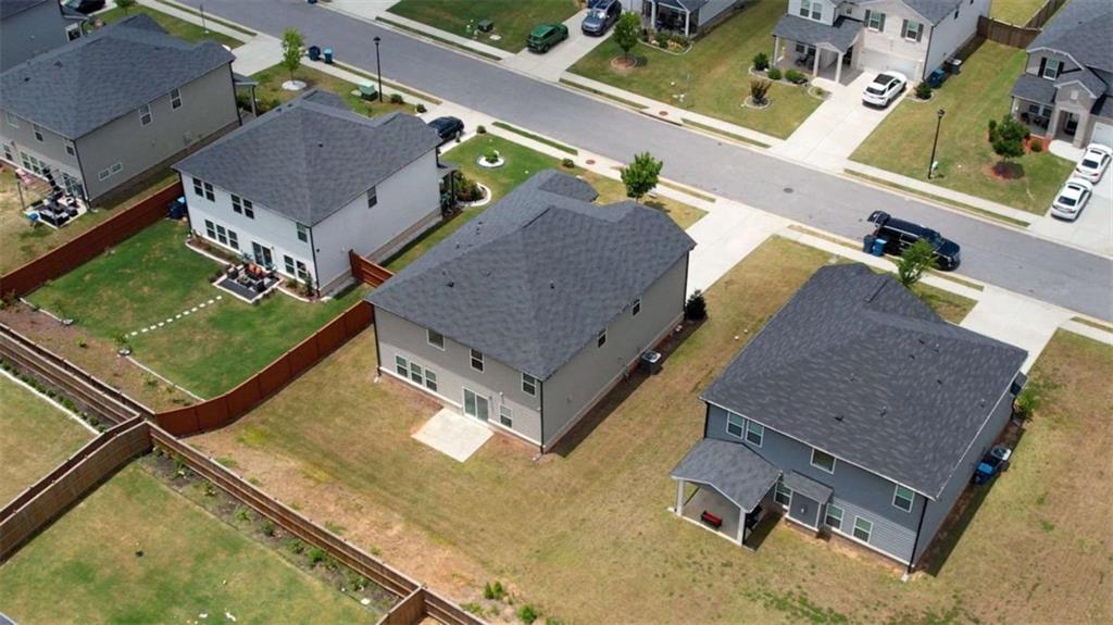 719 Sara Meadow Road Loganville, GA 30052 - Photo 69 of 74 an aerial view of a house with a swimming pool