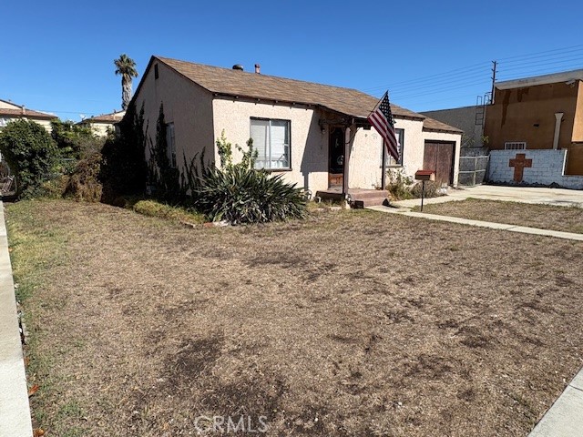 4817 West 119th Street Hawthorne, CA 90250 - Photo 3 of 6 a view of a house with a backyard