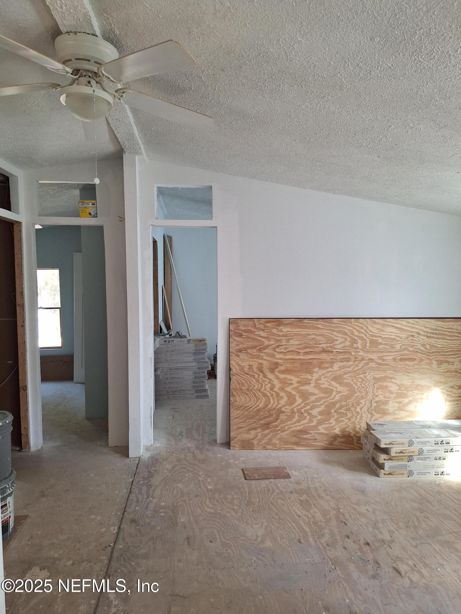 601 Hoover Road Interlachen, FL 32148 - Photo 19 of 33 an empty room with fan