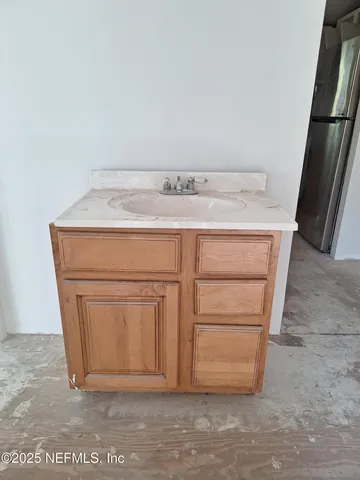 a utility room with washer and dryer