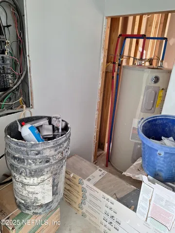 a bathroom with a glass shower door