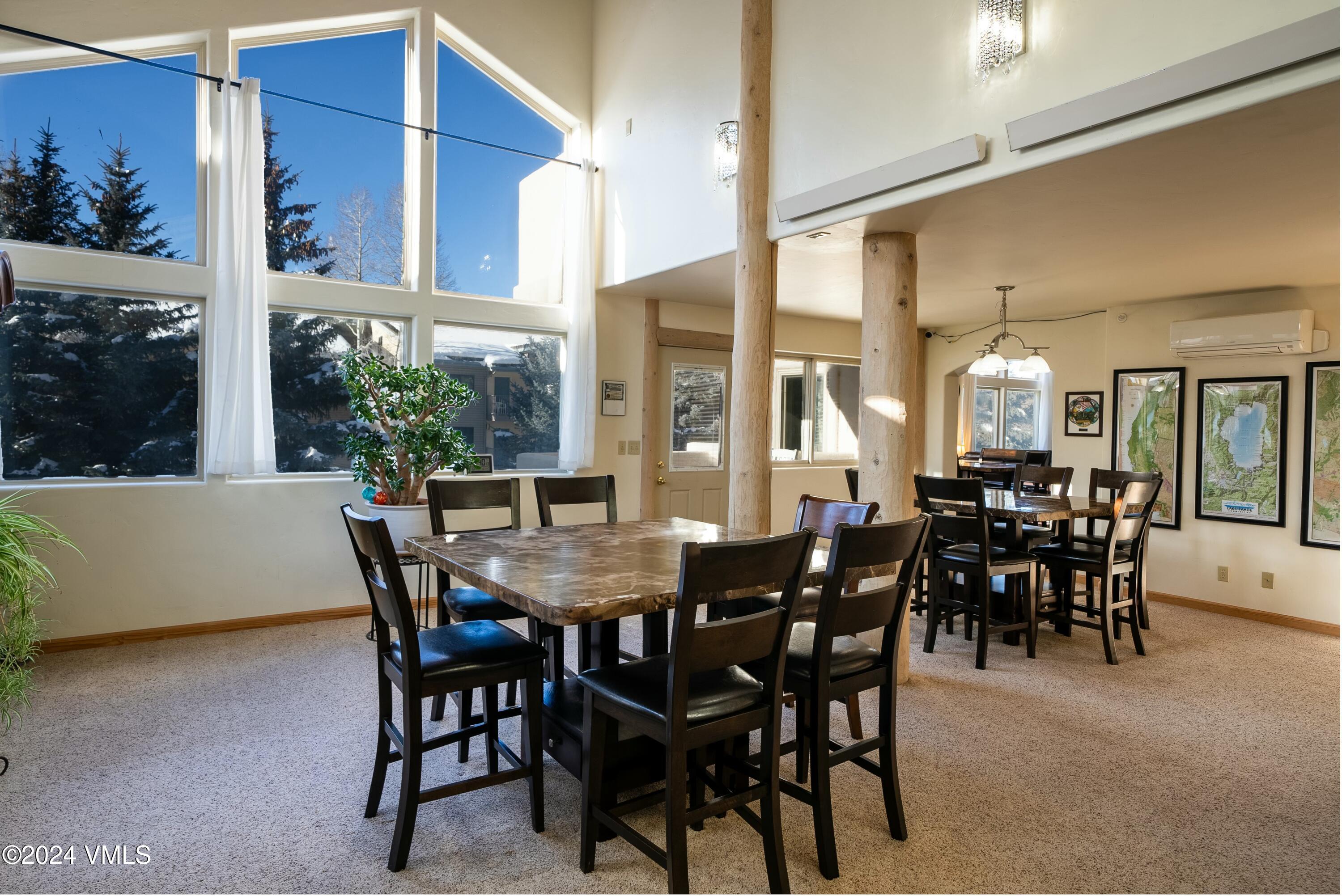 228-238 West Beaver Creek Boulevard, Unit A & B Avon, CO 81620 - Photo 2 of 72 a view of a dining room and a table and chairs