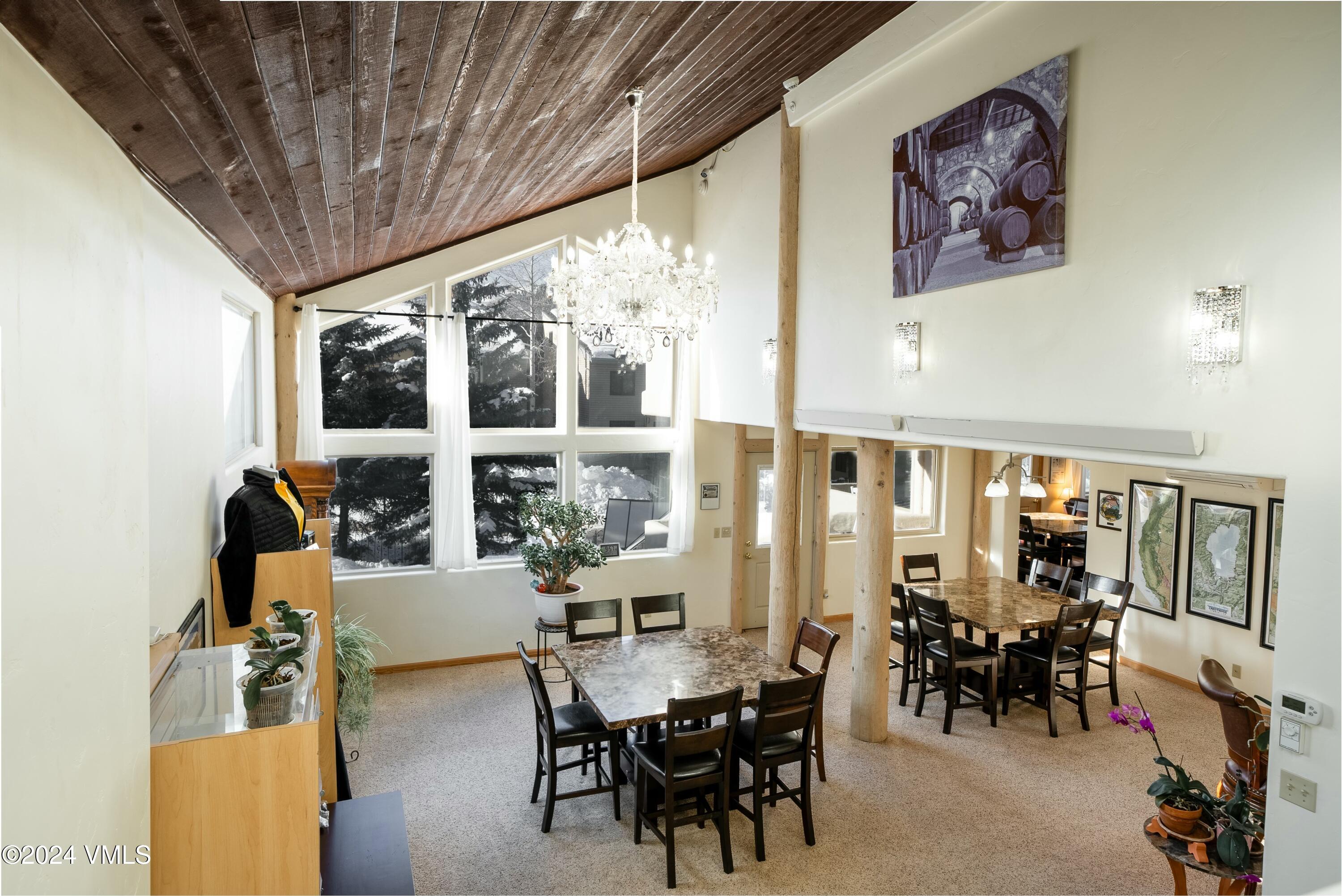 228-238 West Beaver Creek Boulevard, Unit A & B Avon, CO 81620 - Photo 4 of 72 a view of a dining room with furniture window and outside view