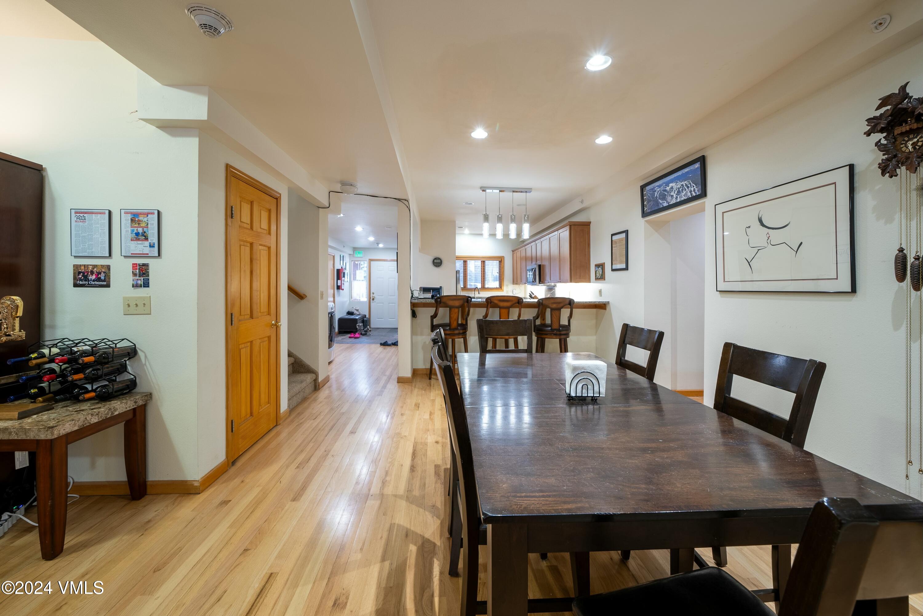 228-238 West Beaver Creek Boulevard, Unit A & B Avon, CO 81620 - Photo 48 of 72 a view of a dining room with furniture and wooden floor