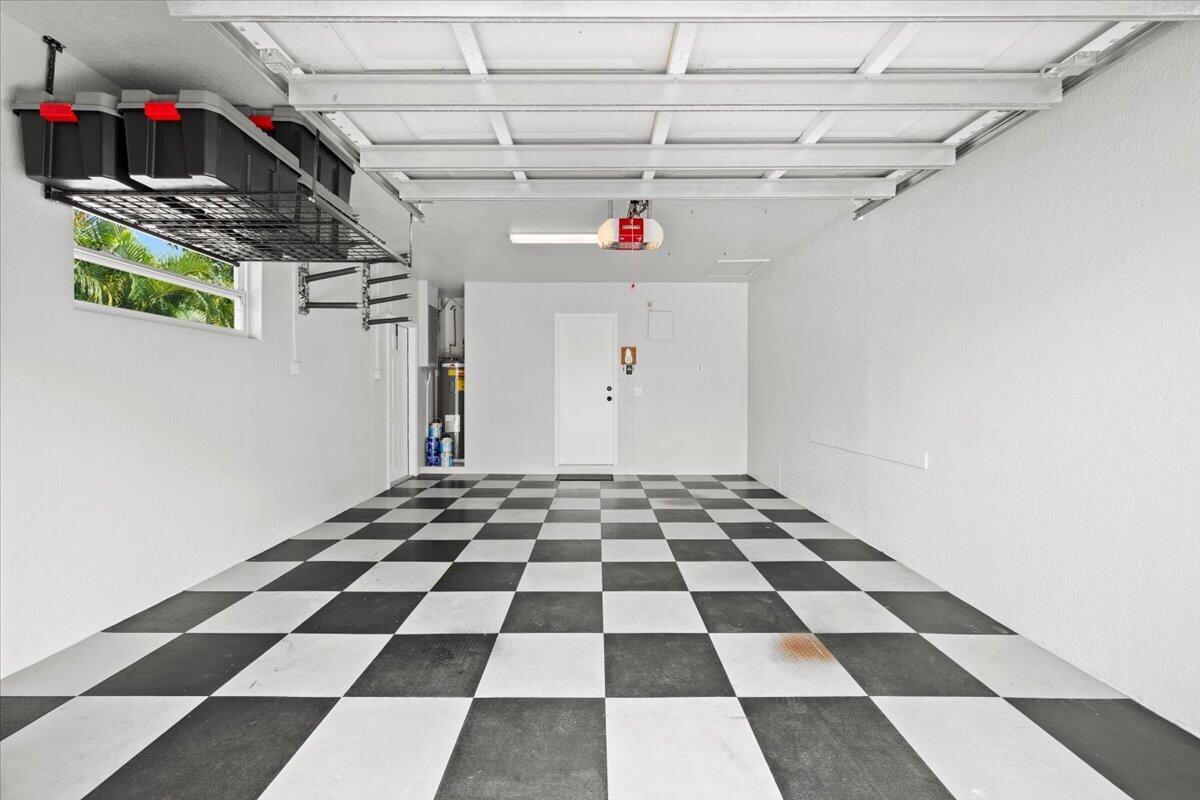 38 Southwest 10th Avenue Boca Raton, FL 33486 - Photo 41 of 44 One-Car Garage | Overhead Storage