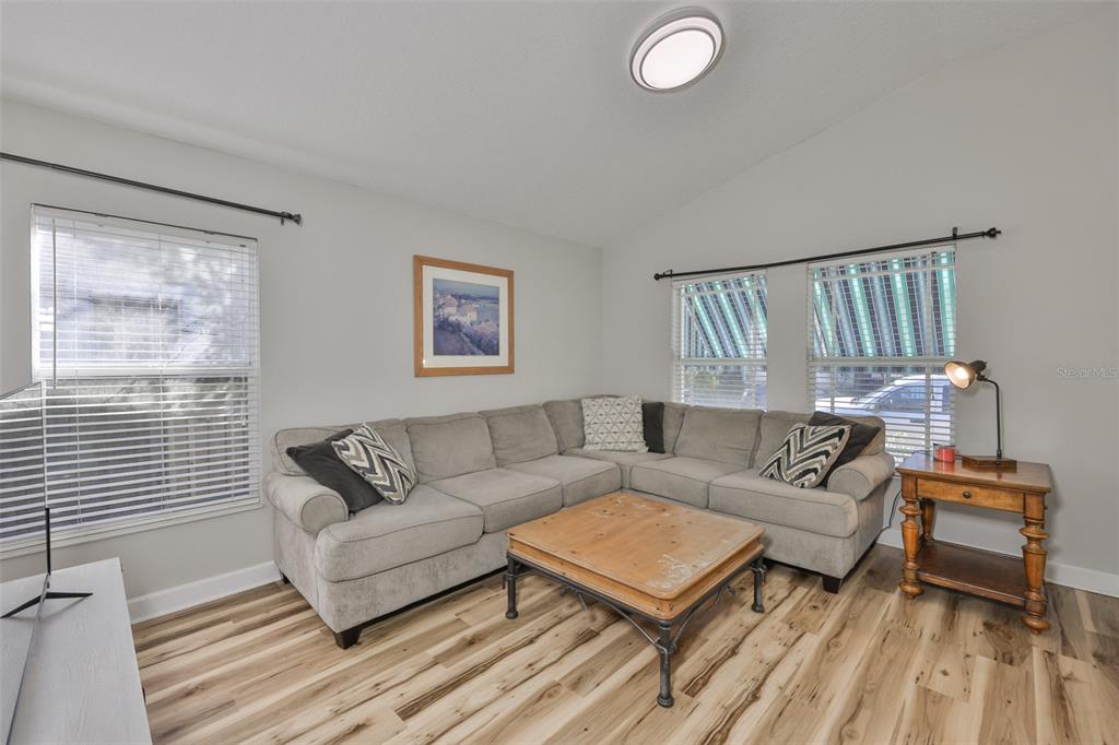 2331 West Chestnut Street Tampa, FL 33607 - Photo 7 of 33 a living room with furniture and a window