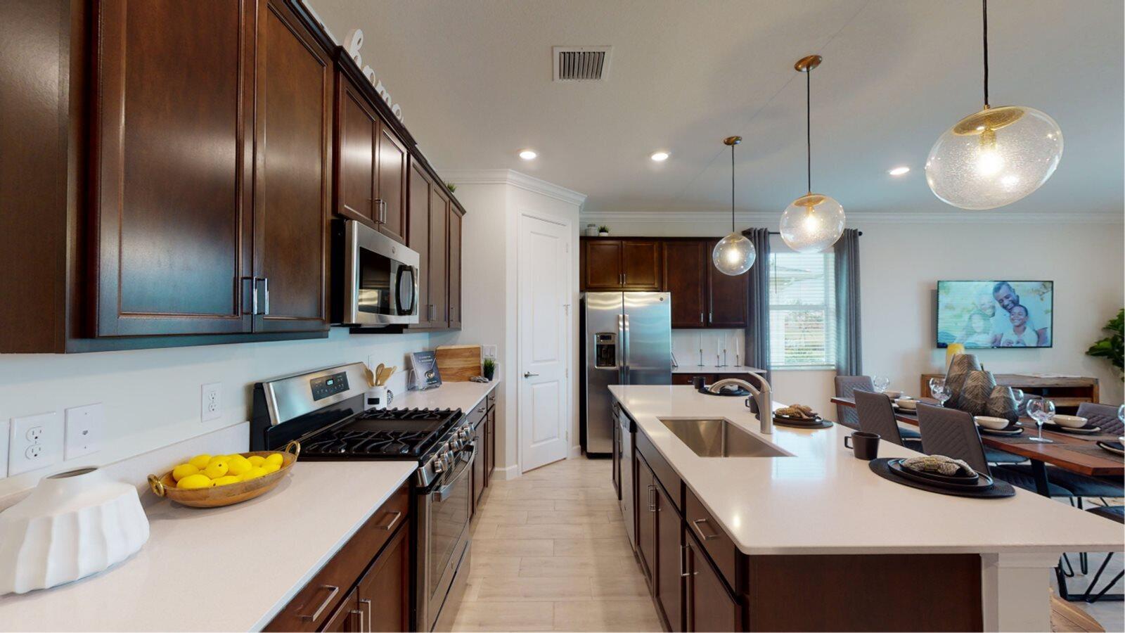 1284 Southeast Woodbine Road Port St. Lucie, FL 34984 - Photo 2 of 11 PBH_1691_Pic_Magnolia_Kitchen_2of2_Base2