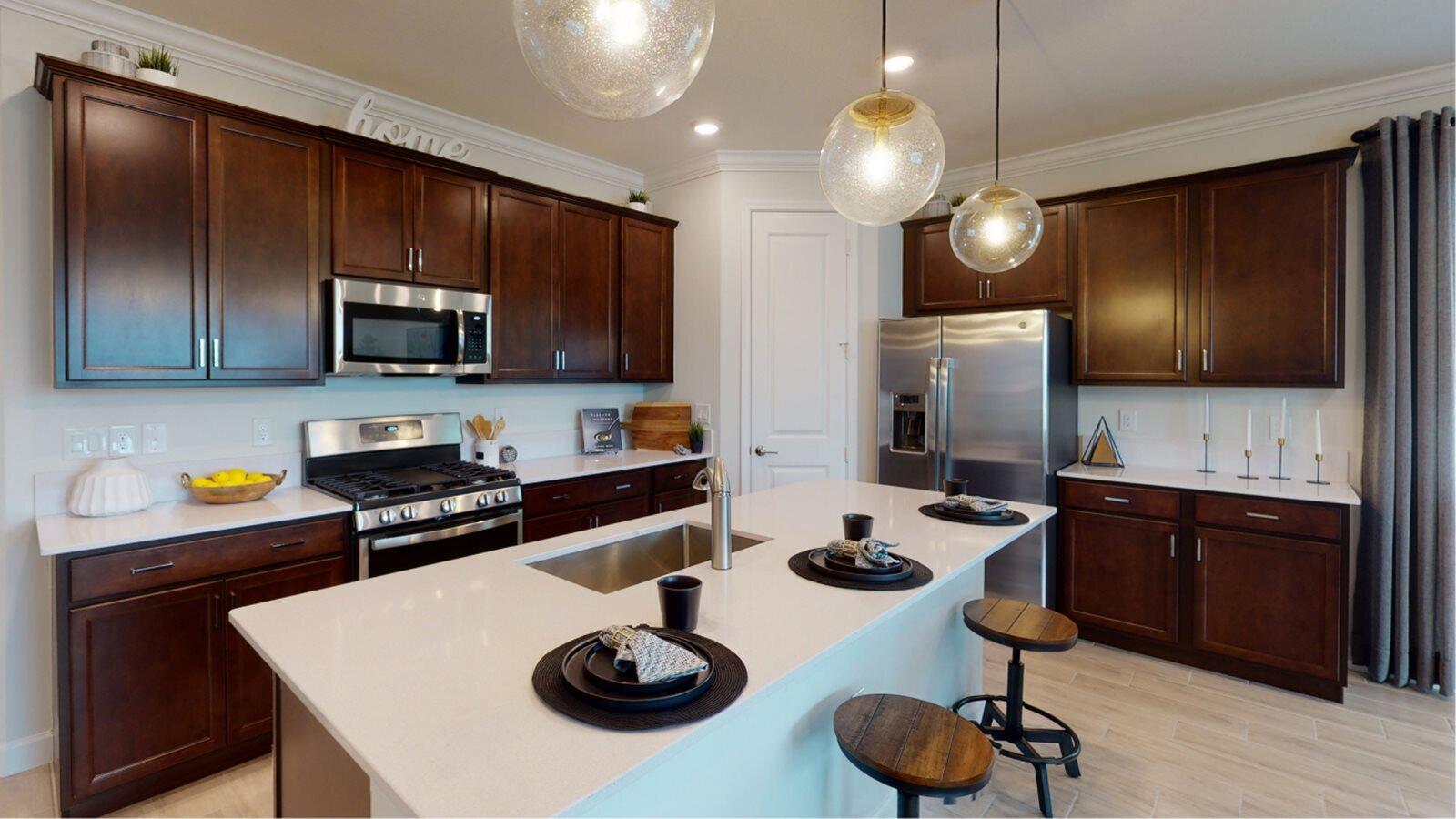 1284 Southeast Woodbine Road Port St. Lucie, FL 34984 - Photo 3 of 11 PBH_1691_Pic_Magnolia_Kitchen_1of2_Base2
