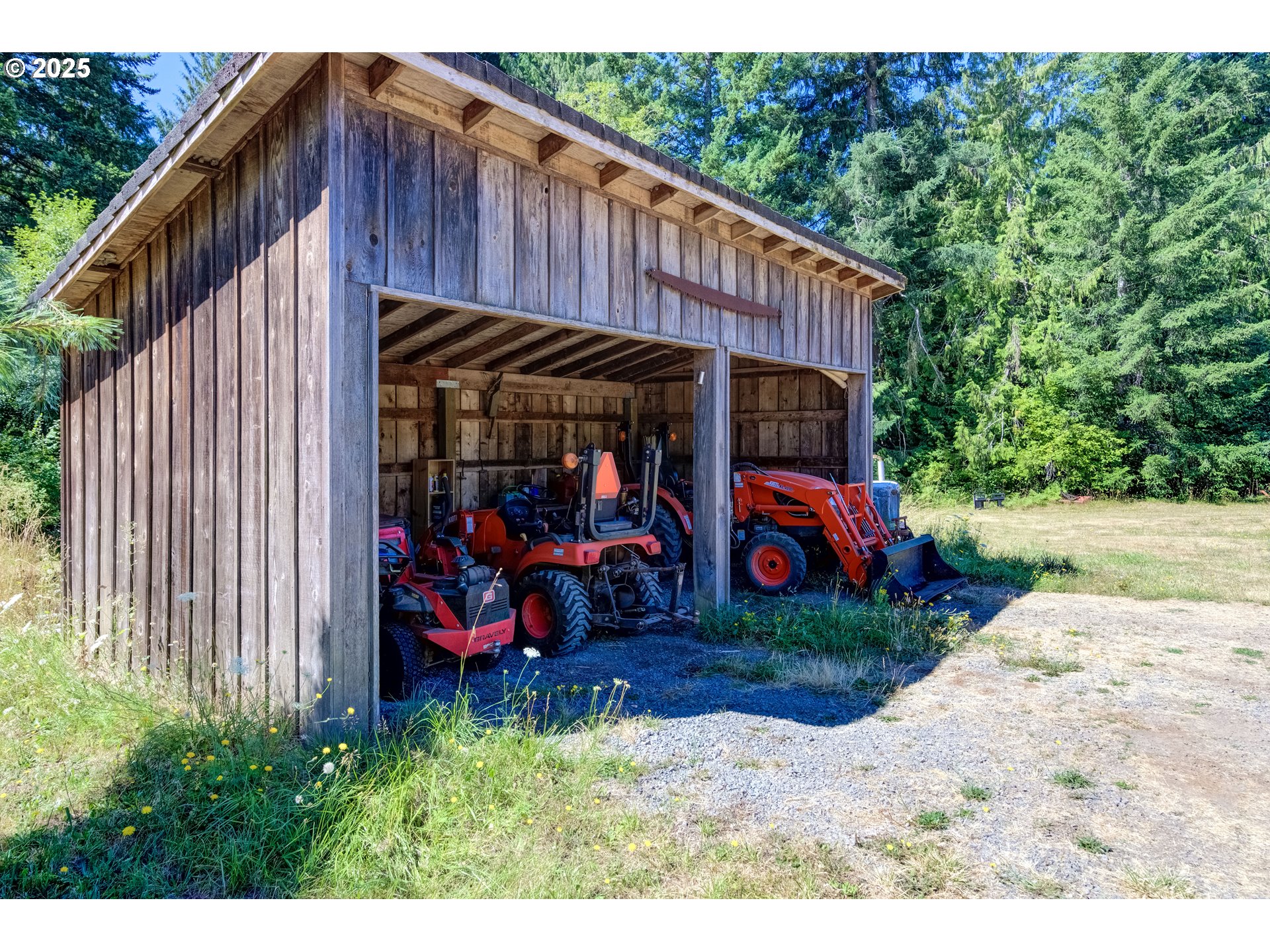 25113 South Ridge Road Beavercreek, OR 97004 - Photo 27 of 43 a view of a small house in the back yard