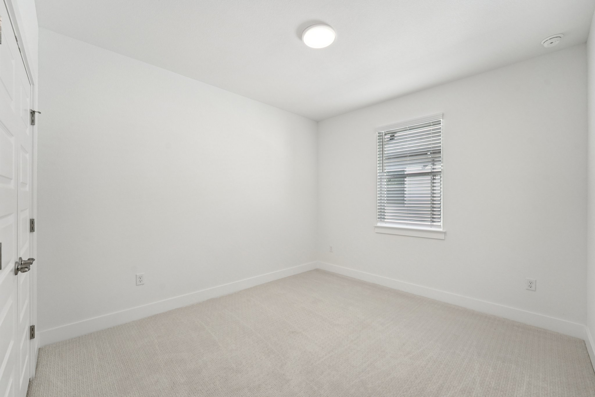 200 West 56th Street, Unit 5103 Austin, TX 78751 - Photo 20 of 29 an empty room with windows