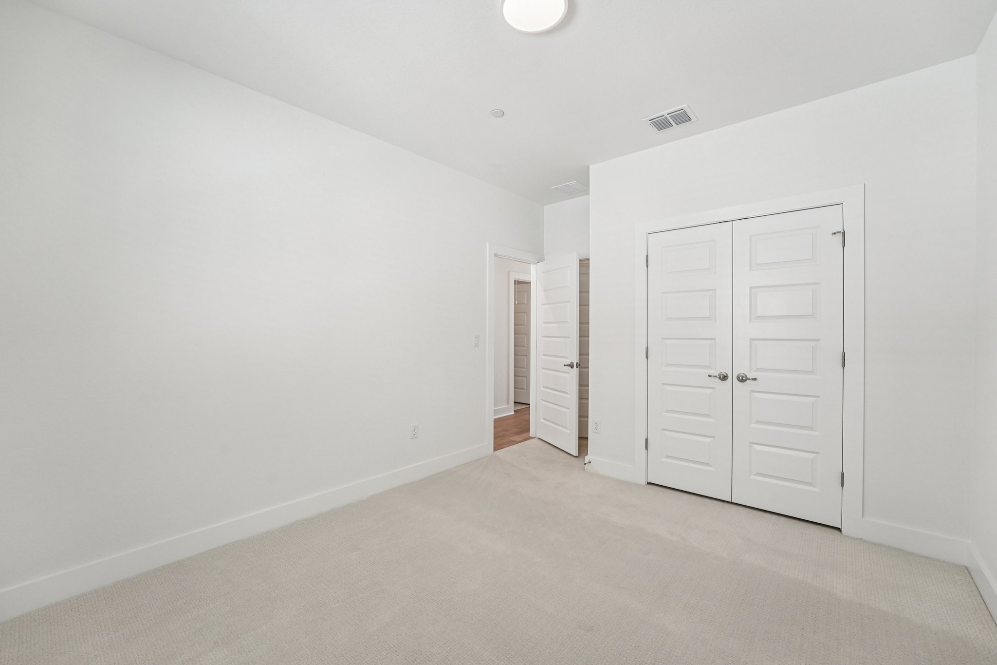 200 West 56th Street, Unit 5103 Austin, TX 78751 - Photo 21 of 29 an empty room with closet area