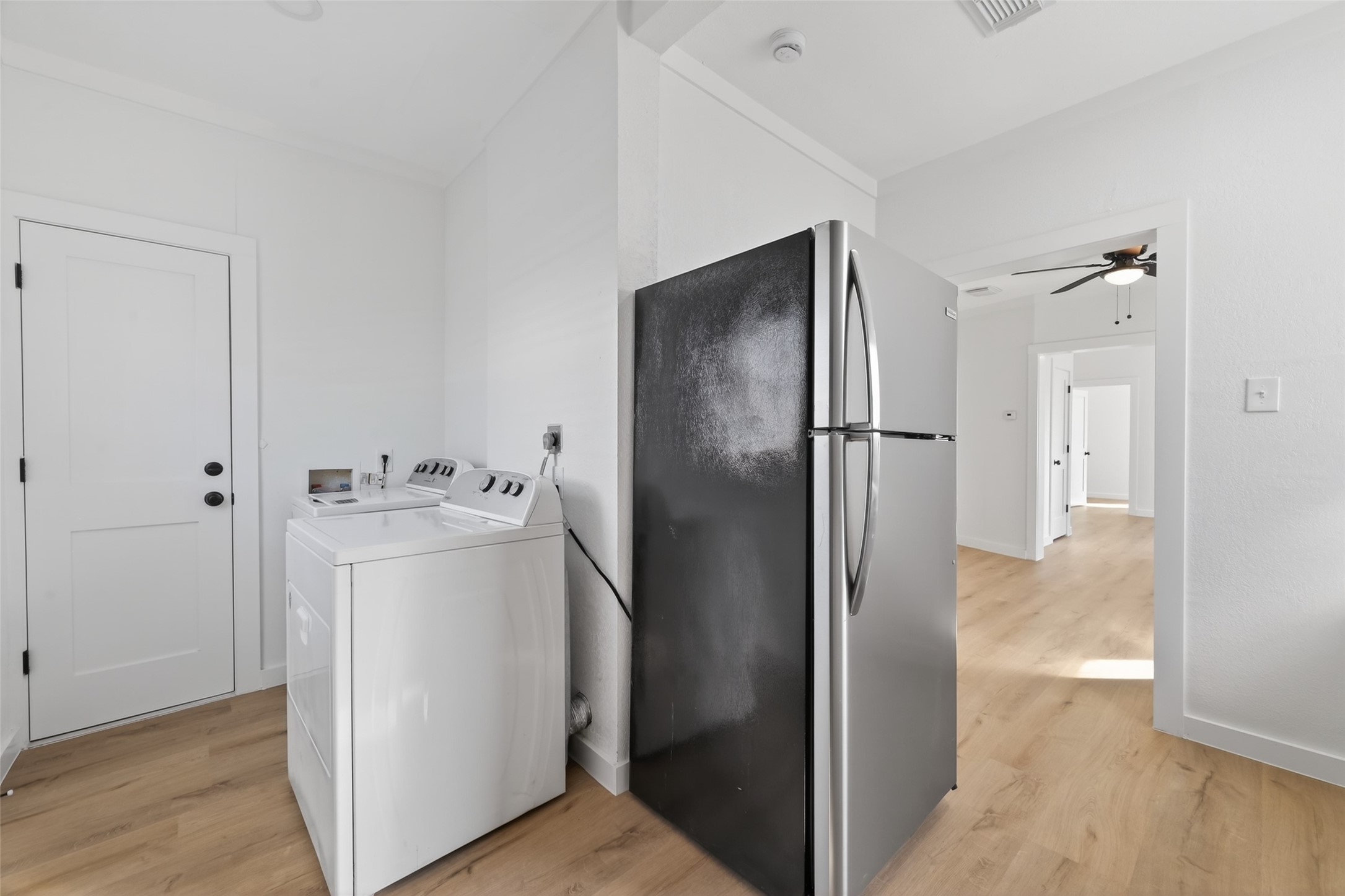 2202 Hutchins Street, Unit C Houston, TX 77003 - Photo 11 of 27 a view of a storage & utility room with a washer dryer