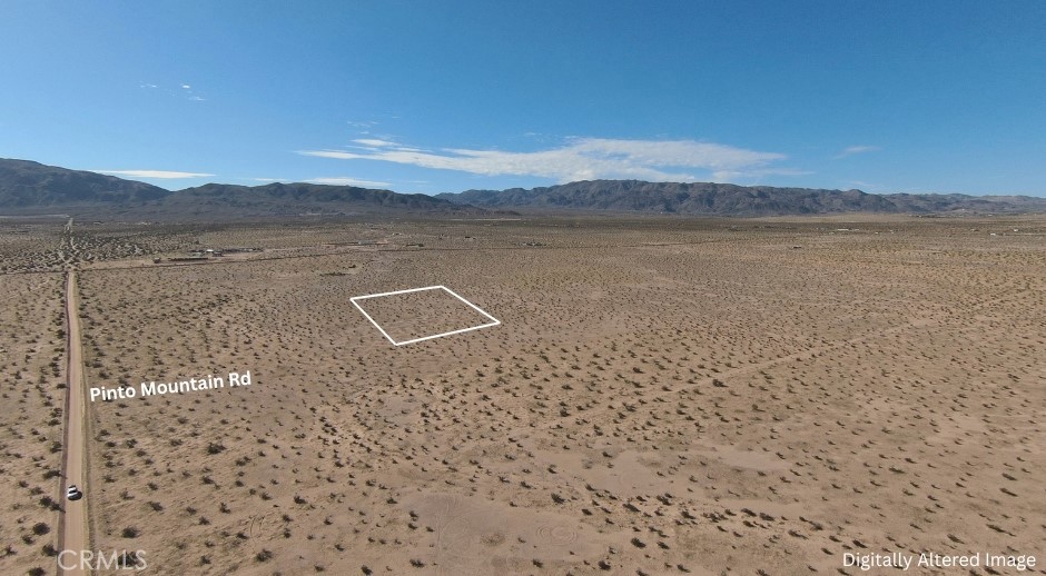 5522 Pinto Mountain Road Twentynine Palms, CA 92277 - Photo 3 of 9 a view of a lake with mountain in the background