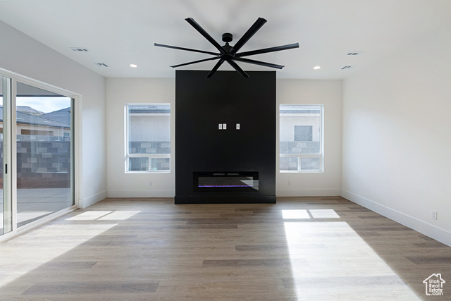 3145 Snow Cyn Road Hurricane, UT 84737 - Photo 5 of 38 Unfurnished living room with light wood finished floors, recessed lighting, and a ceiling fan