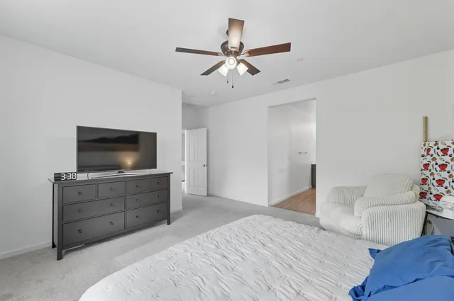 a bedroom with a bed and a view