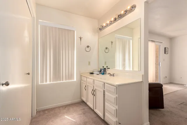 a kitchen with a sink and a window