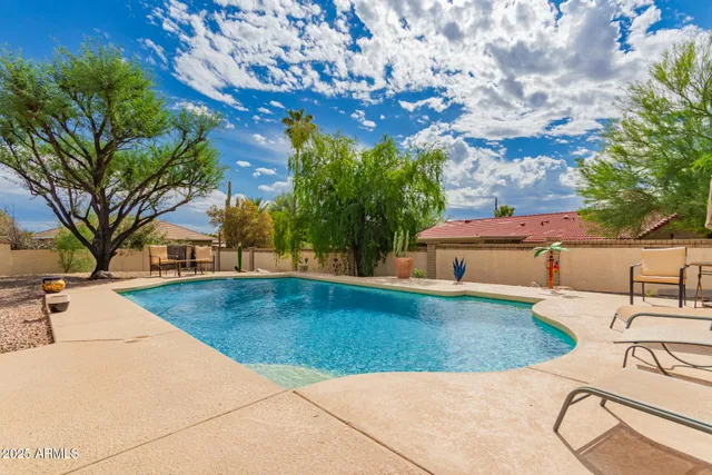 a view of tree in front of a house