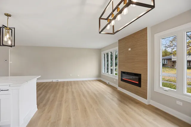 a view of main area window and fire place