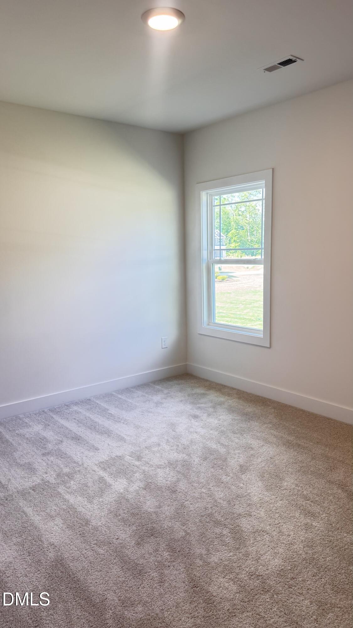 20 Streamline Court Lillington, NC 27546 - Photo 9 of 46 an empty room with a window